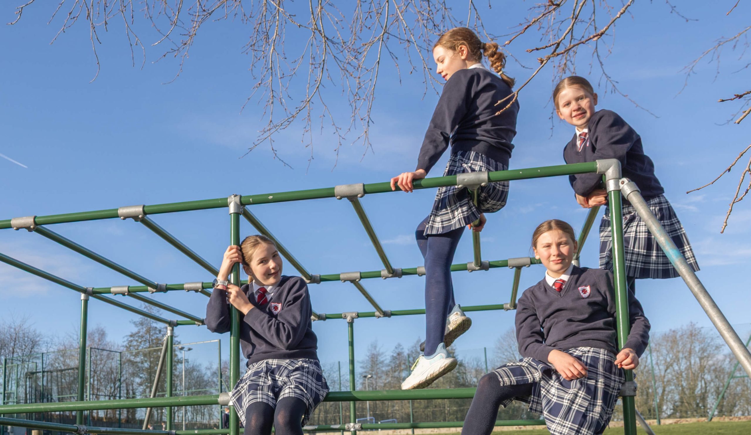 Girls on climbing frame